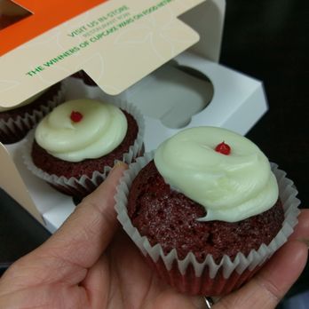 Hokulani Bake Shop - Literally almost half the original size! Cupcakes usually spills over side of paper...not these ones! - Bakeries Near Me - Honolulu, Hawaii