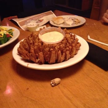 Texas Roadhouse - Cactus blossom fancy name for deep fried onion rings. The batter is delicious and its paired with a tasty sauce. - Steakhouses Near Me - Goodyear, Arizona Texas Roadhouse - Cactus blossom fancy name for deep fried onion rings. The batter is delicious and its paired with a tasty sauce. - Steakhouses Near Me - Goodyear, Arizona