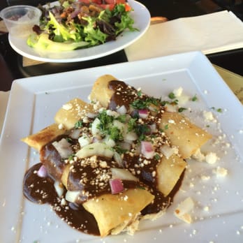 The Roasted Garlic - Margarita Mondays! Chicken Enchiladas and salad. - American Near Me - Pittsfield, Massachusetts