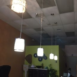 The addition of two beautiful crystal chandeliers makes it feel quite elegant and here