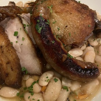 Otto's - duck leg cassoulet with pork belly and sausage over white beans. - German Near Me - Fredericksburg, Texas Otto's - duck leg cassoulet with pork belly and sausage over white beans. - German Near Me - Fredericksburg, Texas