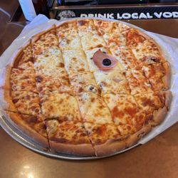 J & G Pizza Palace - Ham and black olive large pizza.