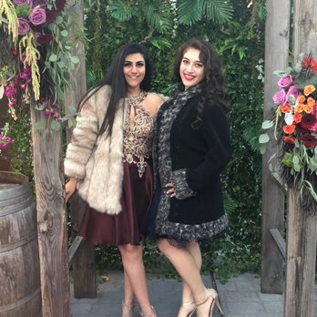 UR Interiors - People loved the green wall and were doing their own photo shoots in front of it - Interior Design Near Me