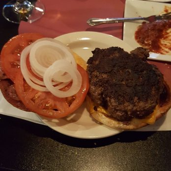 Krug's Tavern - My too done burger and raw onion. Still not too bad though. - Dive Bars Near Me - Newark, New Jersey