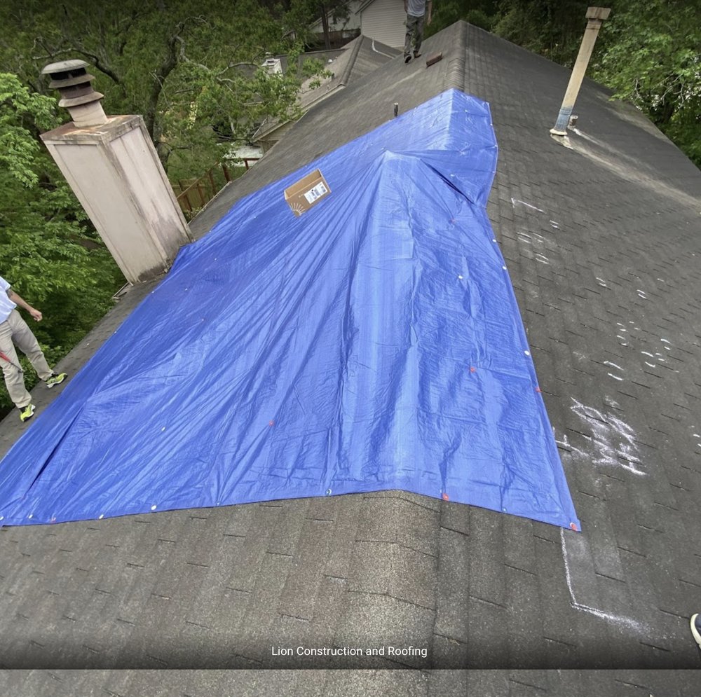 Slide of Lion Construction and Roofing