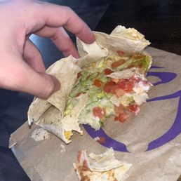Got a crunch wrap supreme half was beans and meat other half was sour cream lettuce and tomato's no justice no peace...