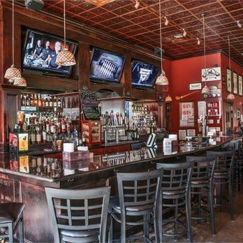 The Public House - a bar with chairs and televisions - Irish Pub Near Me - Katy, Texas