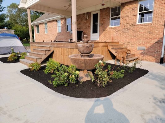 Brand new landscaping design. Flower/plant, mulch, and fountain installation. - This is a new landscape creation one of my first, added beautiful hydrangeas, with some dark, colored mulch, and a gorgeous automatic water fountain. Brand new landscaping design. Flower/plant, mulch, and fountain installation. - This is a new landscape creation one of my first, added beautiful hydrangeas, with some dark, colored mulch, and a gorgeous automatic water fountain.