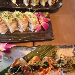 Half eaten rolls from top to bottom: Green Dragon, Geisha, Pacific Northwest Half eaten rolls from top to bottom: Green Dragon, Geisha, Pacific Northwest