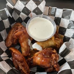 Wings, half raspberry chipotle, half spicy asian Wings, half raspberry chipotle, half spicy asian