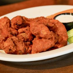 Ten jumbo boneless chicken wings tossed in Classic Buffalo, Spicy Hawaiian, Mango Habanero, or Zesty BBQ.