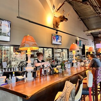 Big Spring Spirits - a bar with a deer head on the wall - Distilleries Near Me - Bellefonte, Pennsylvania Big Spring Spirits - a bar with a deer head on the wall - Distilleries Near Me - Bellefonte, Pennsylvania