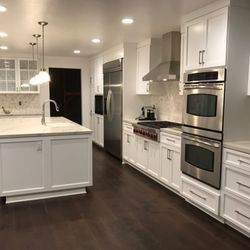 New Leaf Remodeling - Nice contrast with the dark wood floors and white cabinets