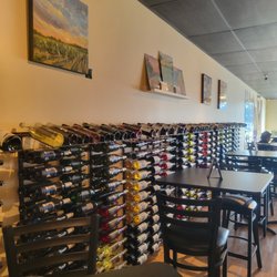 Michigan By The Bottle Tasting Room - Wine bottle showcase