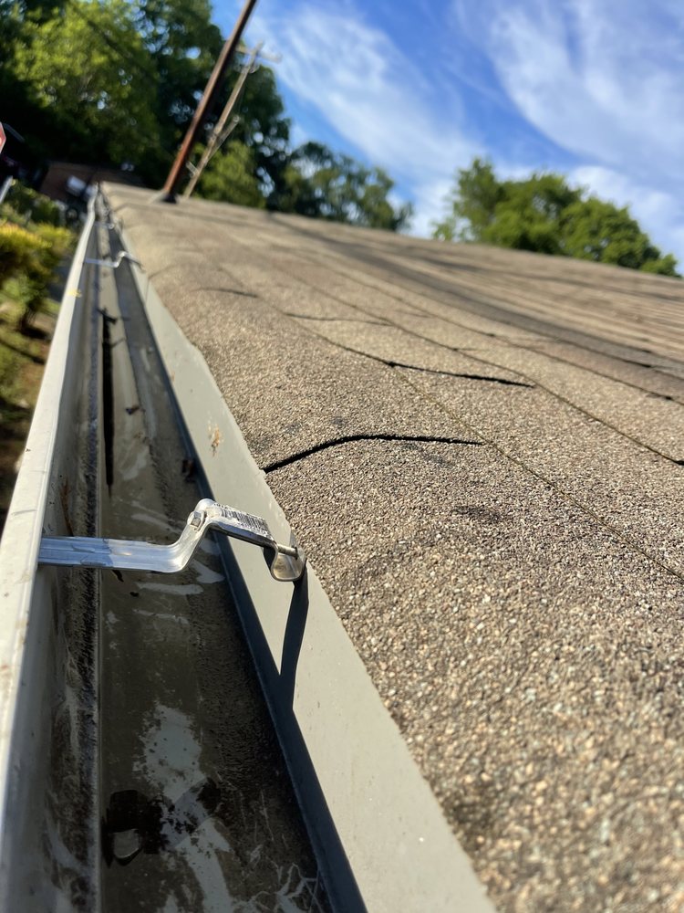 Slide of Marcus Gutters Cleaning