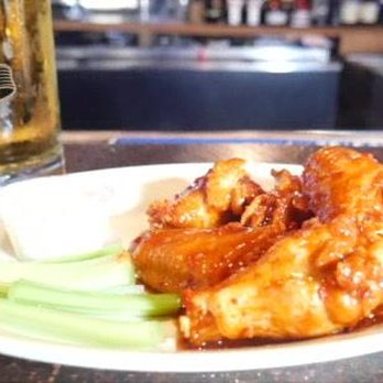 Brown Bag Saloon - a plate of wings and celery - Sports Bars Near Me - Victoria, Texas Brown Bag Saloon - a plate of wings and celery - Sports Bars Near Me - Victoria, Texas