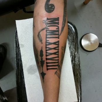 Serious Ink Tattoo Studio - Roman numeral birth year done by Jorge. One of the best black & gray artists I know. Everything else on my arm is also done by J - Tattoo Near Me - West Covina, California Serious Ink Tattoo Studio - Roman numeral birth year done by Jorge. One of the best black & gray artists I know. Everything else on my arm is also done by J - Tattoo Near Me - West Covina, California