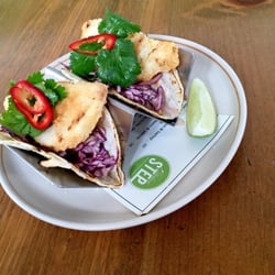 The Kitchen Step - Crispy fish tacos | charred chili sour cream, lime, red cabbage slaw