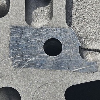 Cylinder Head Service - severe scratches on head surface that were covered under a piece of tape - Appliances & Repair Near Me - Spokane, Washington Cylinder Head Service - severe scratches on head surface that were covered under a piece of tape - Appliances & Repair Near Me - Spokane, Washington