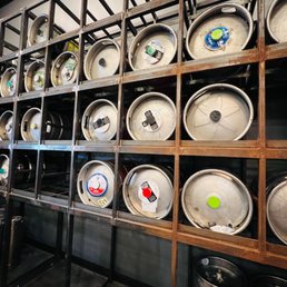 a wall of kegs a wall of kegs