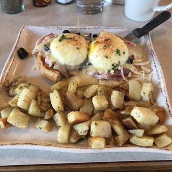 The Egg - PARISIAN BENEDICT- poached eggs, roasted crimini mushrooms and melted Swiss on a buttery croissant half, topped with creamy hollandaise - Breakfast & Brunch Near Me - Steamboat Springs, Colorado