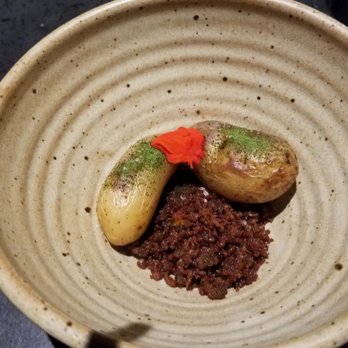 Nonesuch - Okay these were just potatoes with crispy pork.  Definitely my least favorite dish. - New American Near Me - Oklahoma City, Oklahoma