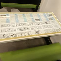 Sensuous Sandwich - Tables have comics to read