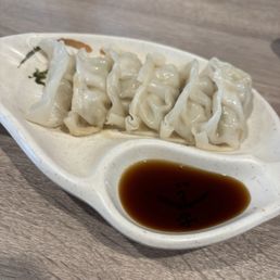 Gyoza is a Chinese dumpling with a mix of pork and chicken. They are sooo good!!