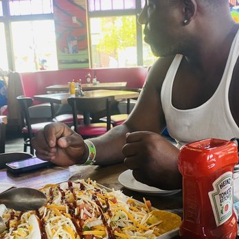 Groovy Goat - My Anthony eating nachos! - Sports Bars Near Me - Foley, Alabama