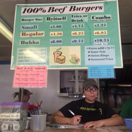 a woman sitting at a counter a woman sitting at a counter