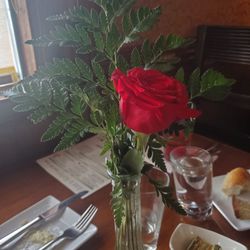 Karling's Seafood And German - A beautiful rose at the table!