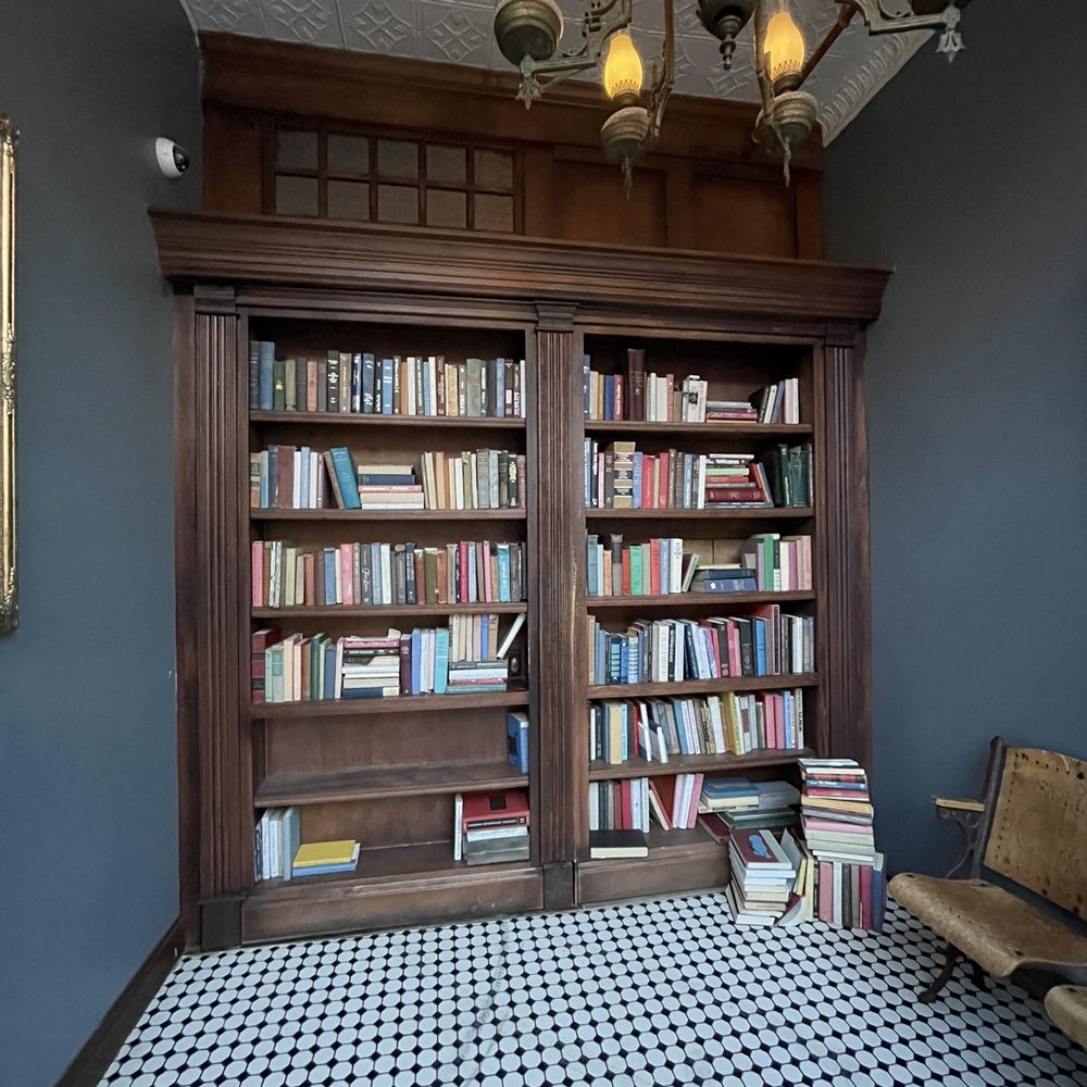 205 Dry - The entrance. The bookshelf on the left is the door! - Speakeasies Near Me - Binghamton, New York