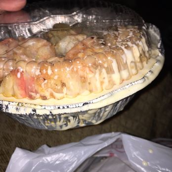 Los Ranchitos - a hand holding a pie - Mexican Near Me - Kewanee, Illinois
