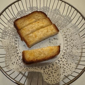 Hy's Steak House - Complimentary cheese bread (composed of three kinds of cheeses) as of 11/23/24. - Steakhouses Near Me - Honolulu, Hawaii Hy's Steak House - Complimentary cheese bread (composed of three kinds of cheeses) as of 11/23/24. - Steakhouses Near Me - Honolulu, Hawaii