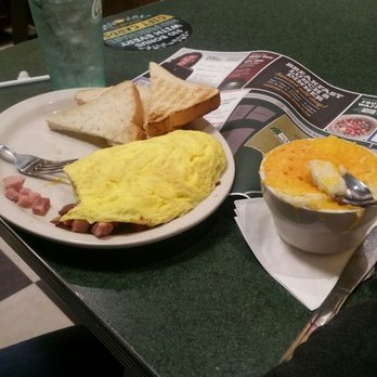 Metro Diner - Meat Lover's Omelette with cheese grits and toast. - Diners Near Me - Augusta, Georgia Metro Diner - Meat Lover's Omelette with cheese grits and toast. - Diners Near Me - Augusta, Georgia