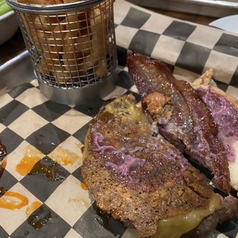 MC Taphouse - Flaming blueberry with fries; smoked Gouda cheese, applewood smoked bacon, blueberry habanero aioli sauce; bleu cheese crisp. - Burgers Near Me - Brooklyn Park, Minnesota
