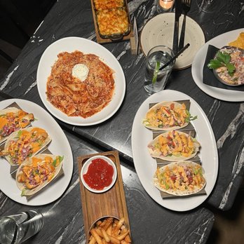 Saint Resto Lounge - Shrimp and chicken tacos, broken lasagna, fries, Mac and cheese, ceviche - Lounges Near Me - New York, New York