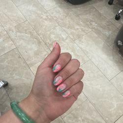 Luke Shaw did a lovely, good job. I was walking in, and he was very detailed and made sure my nails looked perfect before I left!