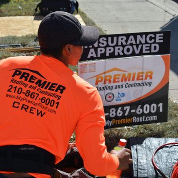 Premier Roofing and Contracting - Premier crew member unpacking tools - Roofing Near Me - San Antonio, Texas