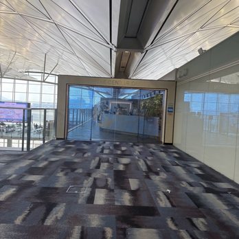 The Centurion Lounge - Entrance to lounge - Airport Lounges Near Me - Hong Kong, HK The Centurion Lounge - Entrance to lounge - Airport Lounges Near Me - Hong Kong, HK