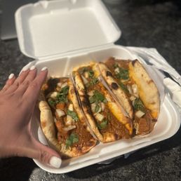 Butter chicken naan tacos