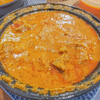 Holi Indian Restaurant - Bone-In Goat Curry - Indian Near Me - Bedford, Massachusetts Holi Indian Restaurant - Bone-In Goat Curry - Indian Near Me - Bedford, Massachusetts