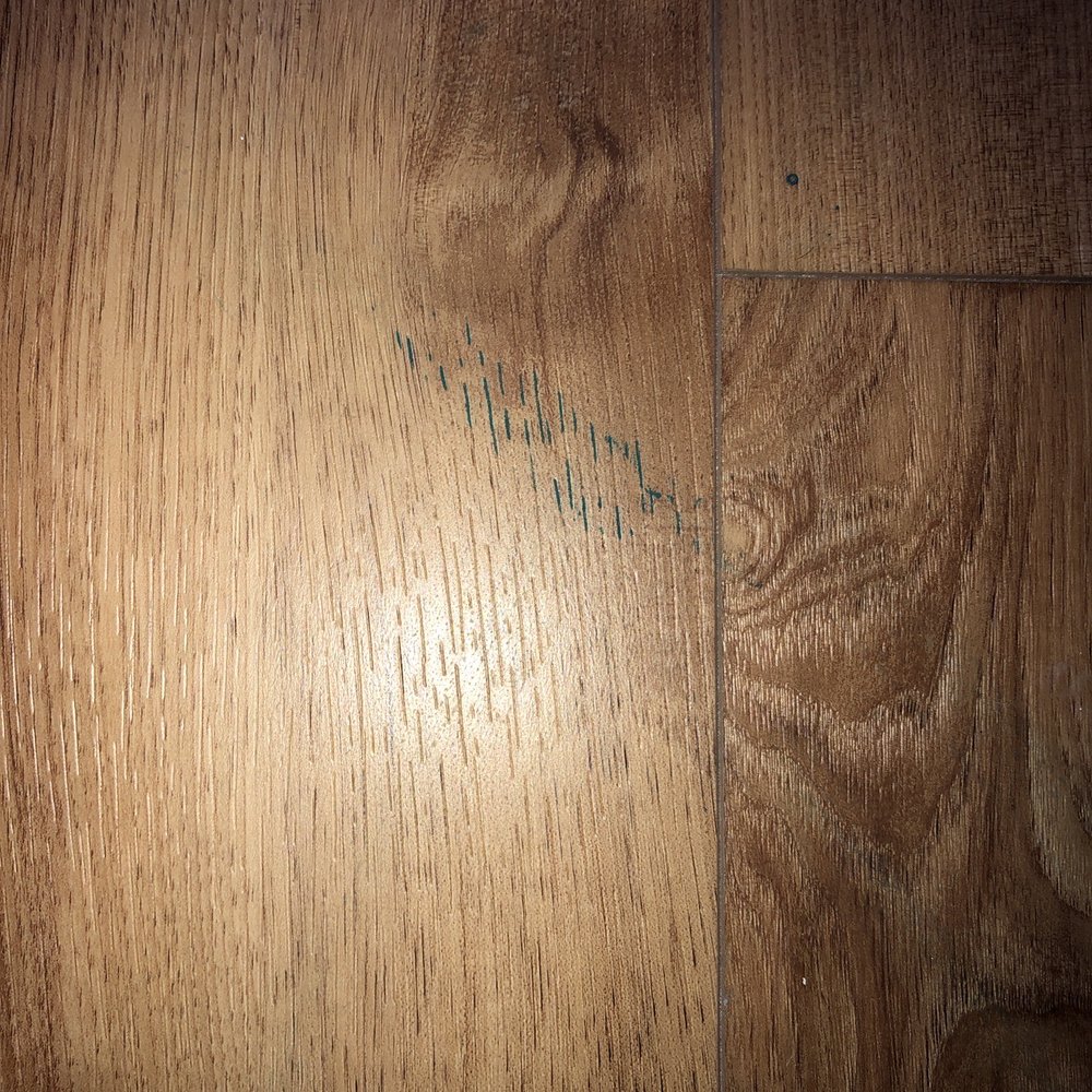 Paint left on brand new floors