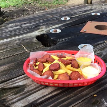 Inka's Joint - Salchipapa (French fries and hotdogs) with huancaina sauce - Peruvian Near Me - Miami, Florida