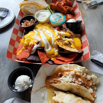 Flamecraft Bar - Signature Sampler - Chicken Quesadillas, Wings, Nachos Brisket Tacos! - Bars Near Me - Orlando, Florida Flamecraft Bar - Signature Sampler - Chicken Quesadillas, Wings, Nachos Brisket Tacos! - Bars Near Me - Orlando, Florida