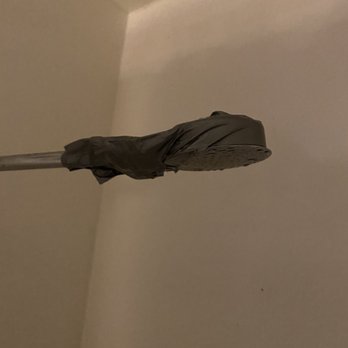 Hotel Derek - Duck tape around the shower head - Hotels Near Me - Houston, Texas Hotel Derek - Duck tape around the shower head - Hotels Near Me - Houston, Texas