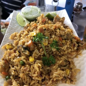 Lamas - Arroz de Marizcos, $20: That small jalapeno cream sauce was enough to light up the whole plate of seafood paella. - Mexican Near Me - Half Moon Bay, California Lamas - Arroz de Marizcos, $20: That small jalapeno cream sauce was enough to light up the whole plate of seafood paella. - Mexican Near Me - Half Moon Bay, California