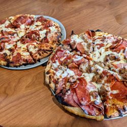 Main Street Pizza - All meat pizza, foreground, New Yorker, background.