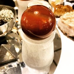 Sunrise Tarot by Daun - Carnelian sphere on selenite stand