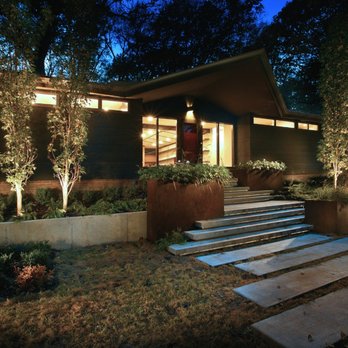 Carson Outdoor Living - a modern home at night - Landscaping Near Me - Valley, Nebraska